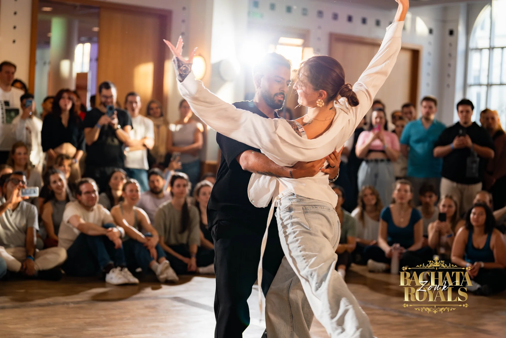 Dance performance in front of the audience at Bachata Zouk Royals in the ballroom