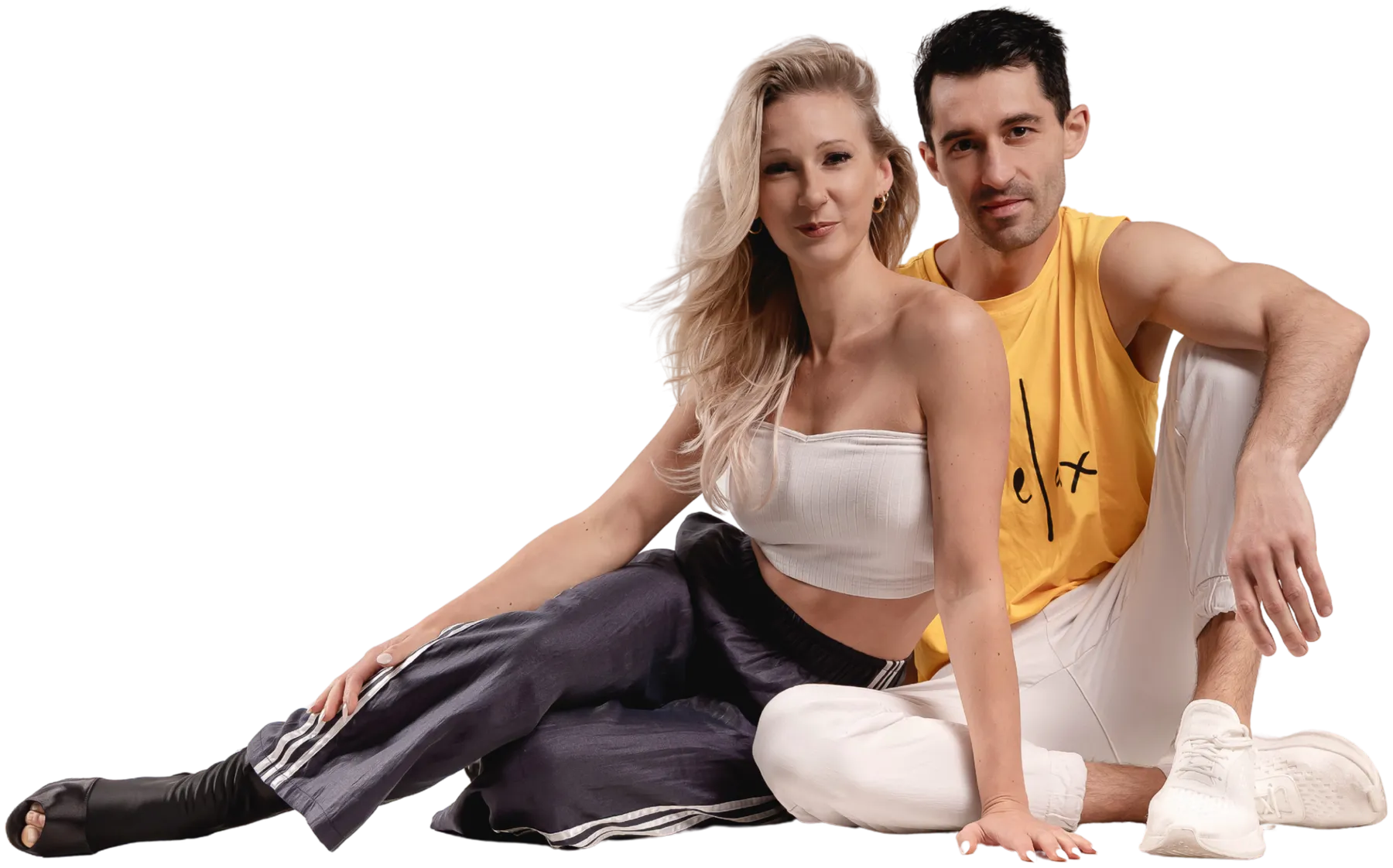 Alexej & Florence sitting relaxed in the studio — the team behind Brazilian Zouk Freiburg
